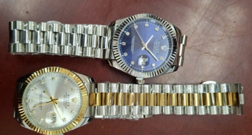 Khám kho hàng, phát hiện lượng lớn sản phẩm giả mạo nhãn hiệu đồng hồ Rolex, mũ thời trang Chanel, Louis Vuitton của Công ty Sơn Hà