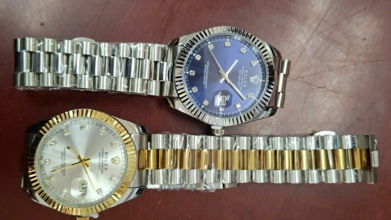 Khám kho hàng, phát hiện lượng lớn sản phẩm giả mạo nhãn hiệu đồng hồ Rolex, mũ thời trang Chanel, Louis Vuitton của Công ty Sơn Hà