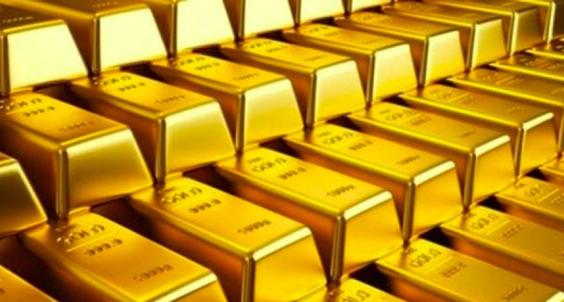 Giá vàng tăng mạnh, USD suy yếu sau tín hiệu hạ lãi suất từ Fed