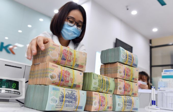 Lãi suất huy động dự kiến hạ nhiệt bất chấp áp lực tín dụng dâng cao